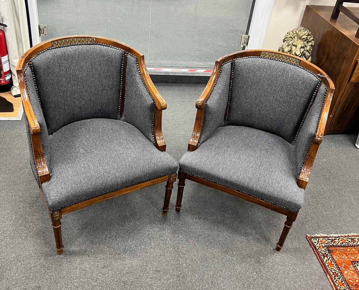 A pair of French Empire style gilt metal mounted upholstered mahogany tub framed chairs, width 62cm, depth 60cm, height 71cm